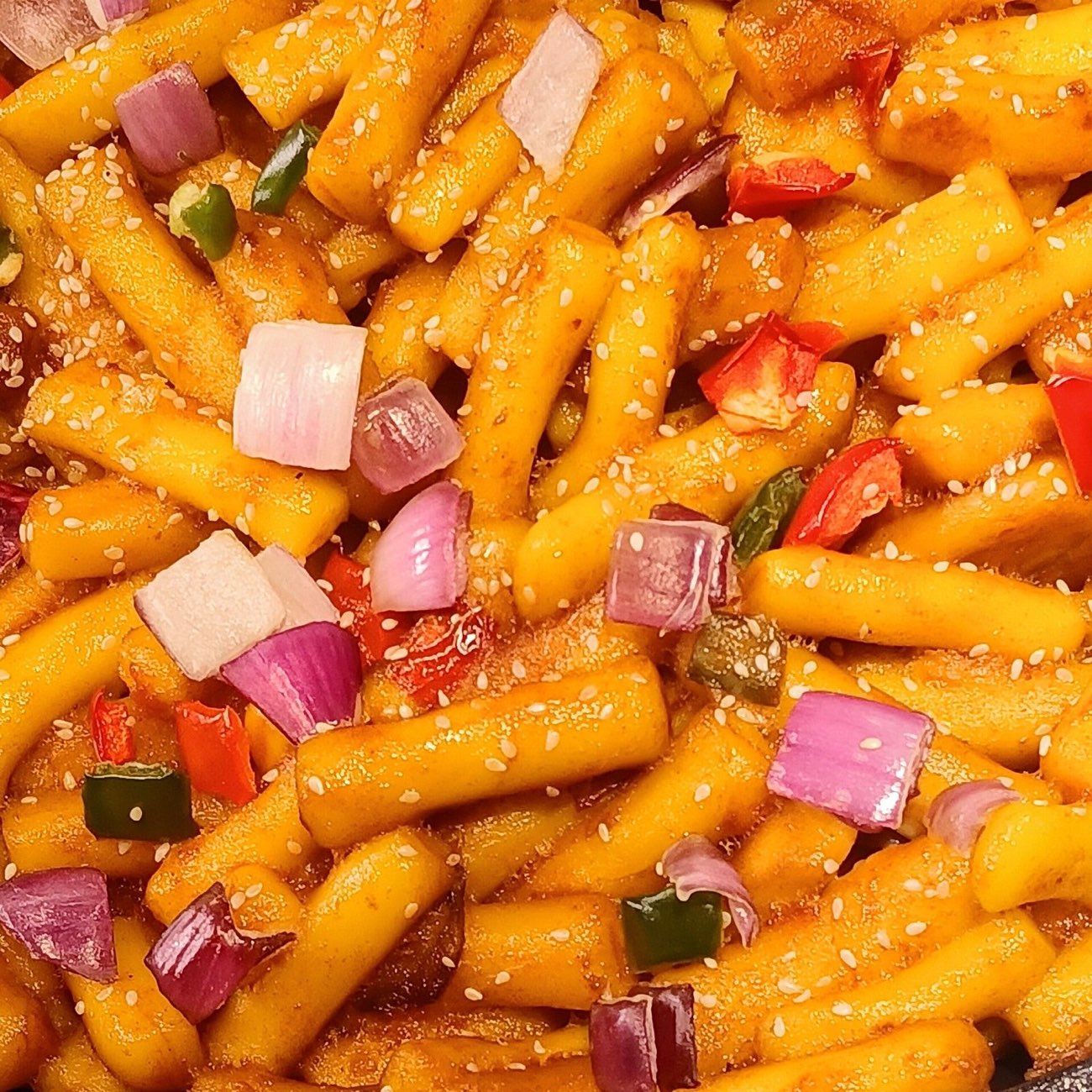 Tteokbokki rice cakes in red sauce at a Seoul snack bar